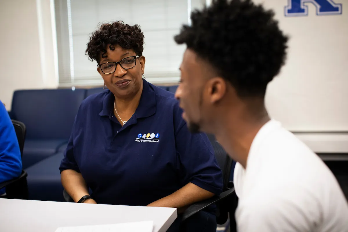 Toni Thomas (left), director for UK's Center for Academic Resources and Enrichment Services (CARES), talks with a student. A new support fund created by UK alumna Mary deGraaf will support students and programming in CARES. Pete Comparoni | UK Photo.