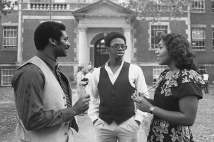 College recruiter Alvin C. Hanley talks to students on campus. He was the first director of the UK's Minority and Disadvantaged Student Recruitment Program.