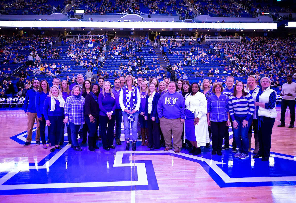 30 of the researchers and staff working on UK's record-setting HEAL grant were honored on the floor at Tuesday night's men's basketball game. Mark Cornelison l UK Photo