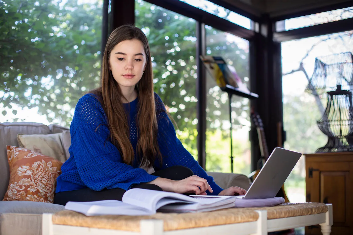 Ella Webster, a freshman at UK, does coursework from home due to COVID-19. Pete Comparoni | UK Photo.