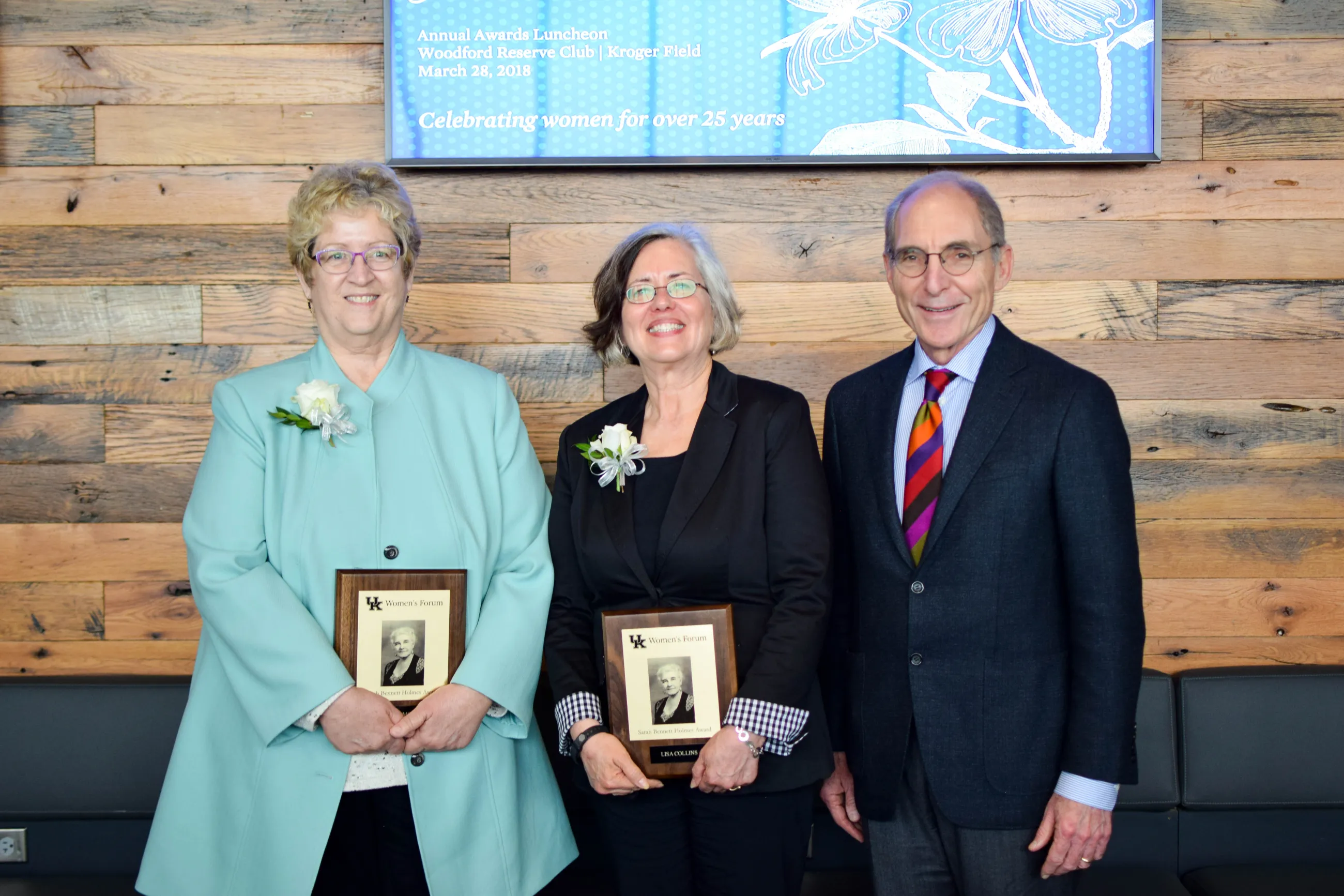 The 2018 Sarah Bennett Holmes Award winners Debra Moser of the College of Nursing and Lisa Collins of the College of Agriculture, Food and Environment with UK President Eli Capilouto. Photo by Sarah Caton.