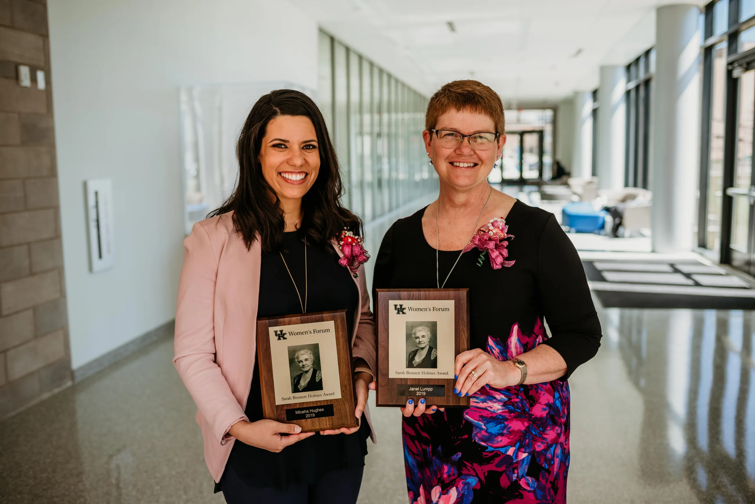 The 2019 Sarah Bennett Holmes Award winners are staff recipient Micaha Hughes, left, and faculty recipient Janet Lumpp, both from the College of Engineering. Photo by Sarah Caton.