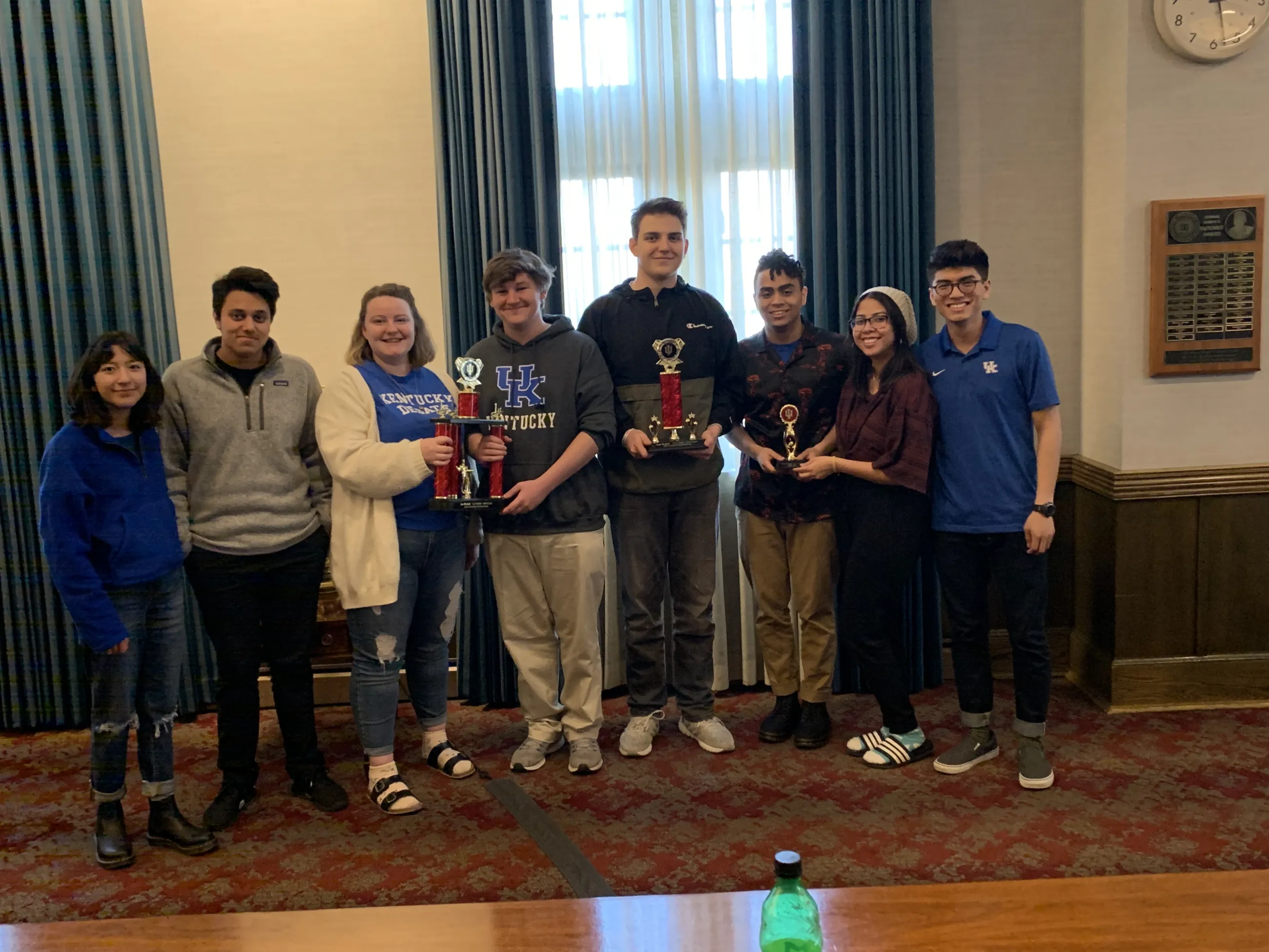 UK Debate Team. L-R: Maria Sanchez, Sulaiman Jamal, Genevieve Hackman, Chris Eckert, Alan Ivackovic, Saturn Kendrick, Stephani Lopez and Chris Lucas.