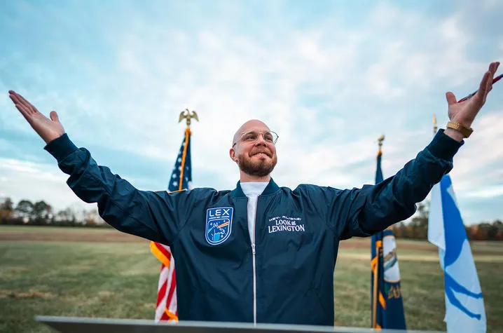 Jonathon Spalding, a UK ISC alum and creative director at Lexington-based ad agency Cornett, at a "Welcome" event at Kentucky Horse Park where they transmitted a message into space on behalf of VisitLEX. Photo provided by VisitLEX.