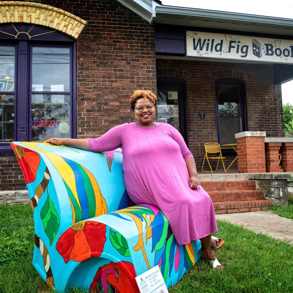 One of Lexington's benches portrays Crystal Wilkinson's 2016 book, "The Birds of Opulence," published by University Press of Kentucky. The bench can be seen outside Wilkinson's Wild Fig. Mark Cornelison | UK Photo.