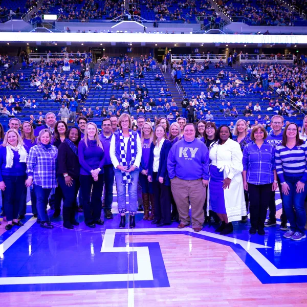 30 of the researchers and staff working on UK's record-setting HEAL grant were honored on the floor at Tuesday night's men's basketball game. Mark Cornelison l UK Photo