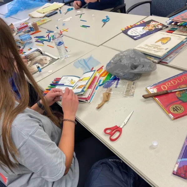 Existing toys often just need a simple fix to become adaptive toys — like adding popsicle sticks to books to help children who have difficulty turning pages.