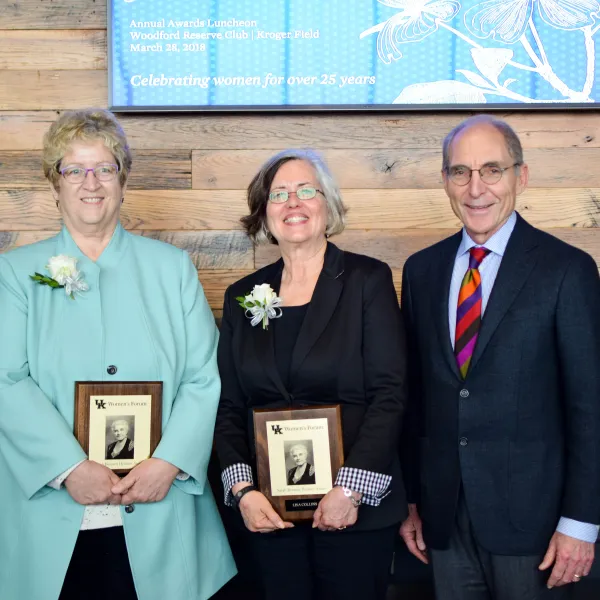 The 2018 Sarah Bennett Holmes Award winners Debra Moser of the College of Nursing and Lisa Collins of the College of Agriculture, Food and Environment with UK President Eli Capilouto. Photo by Sarah Caton.