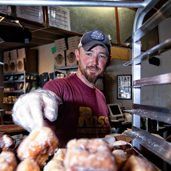 Joe Ross, co-owner of North Lime Coffee and Donuts. Mark Cornelison | UK Photo.