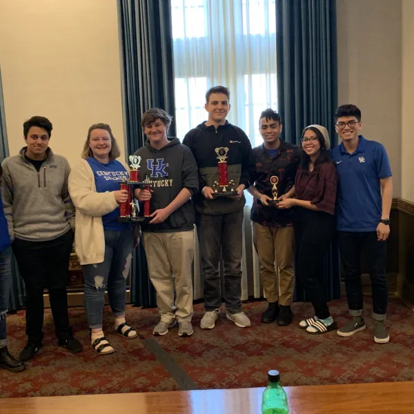 UK Debate Team. L-R: Maria Sanchez, Sulaiman Jamal, Genevieve Hackman, Chris Eckert, Alan Ivackovic, Saturn Kendrick, Stephani Lopez and Chris Lucas.