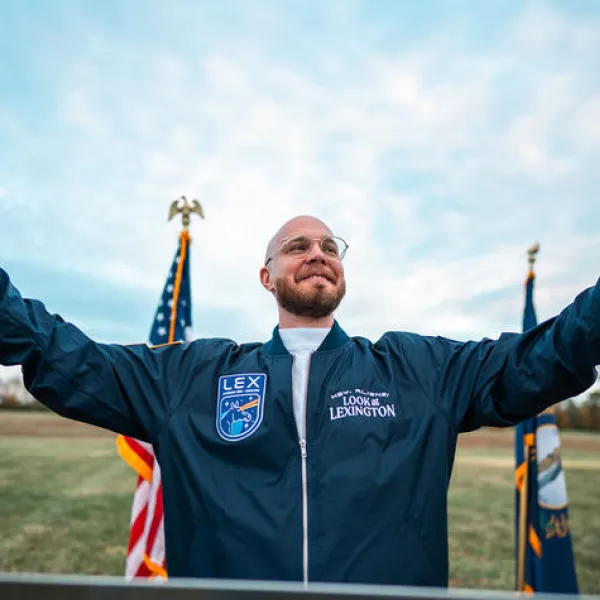 Jonathon Spalding, a UK ISC alum and creative director at Lexington-based ad agency Cornett, at a "Welcome" event at Kentucky Horse Park where they transmitted a message into space on behalf of VisitLEX. Photo provided by VisitLEX.