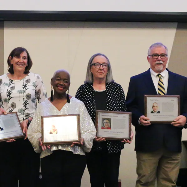 From left, Sheldon Shafer (represented by two of his former coworkers), Betty Winston Bayé, Deborah Taylor Givens, Paul Prather and Peter Baniak. Not pictured: Elizabeth “Scoobie” Ryan and Kyle Vance. Photo credit: Reese Durham.