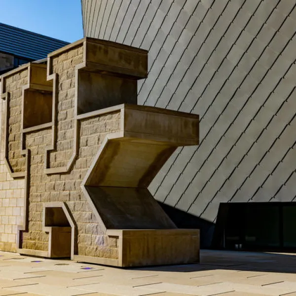 Large concrete University of Kentucky "UK" lockup outside of the Gatton Student Center.