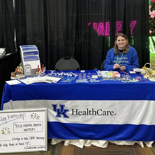 CC Rhein tabling at the Junior League Holly Days market.